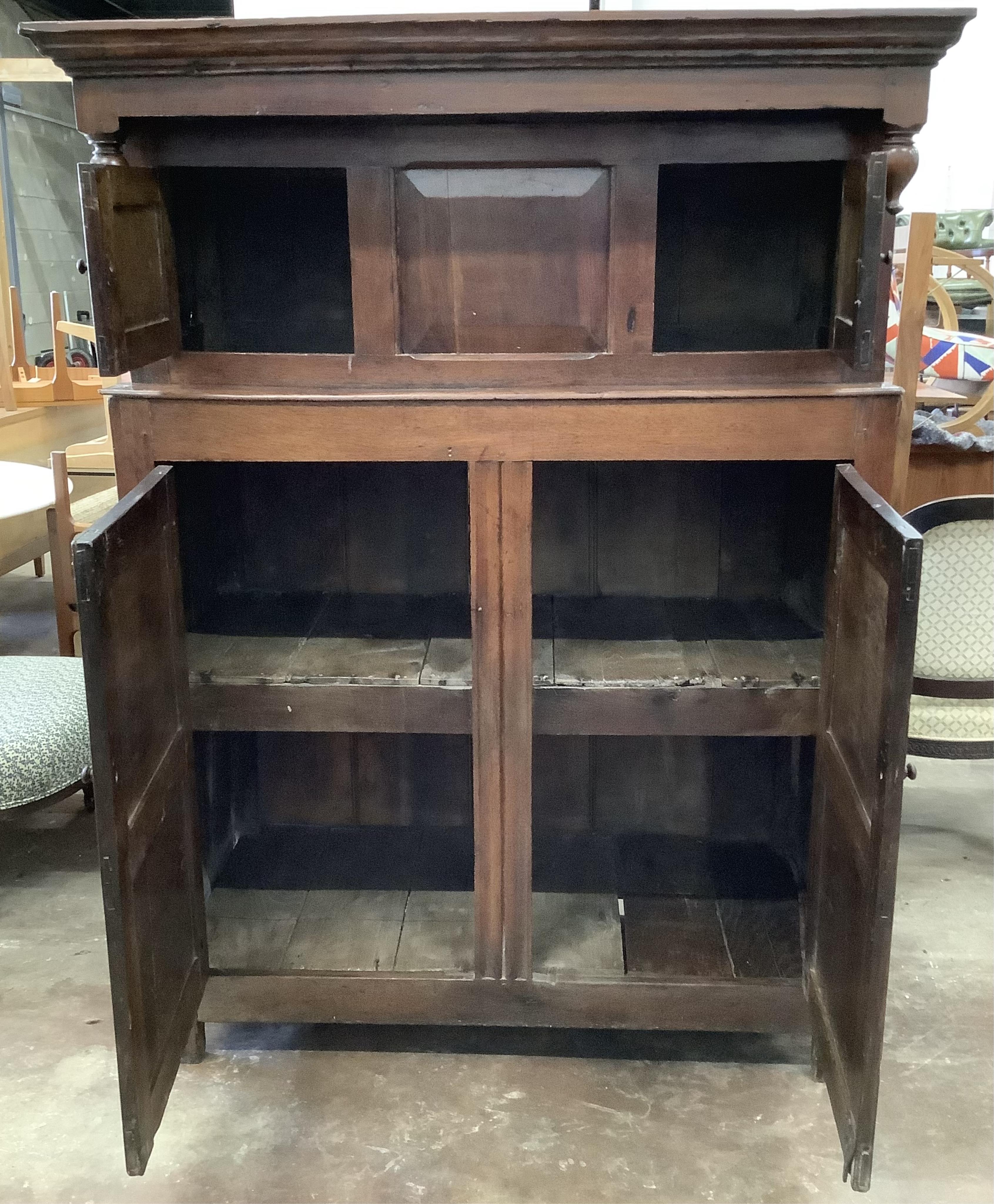 An 18th century oak court cupboard, width 122cm, depth 54cm, height 171cm